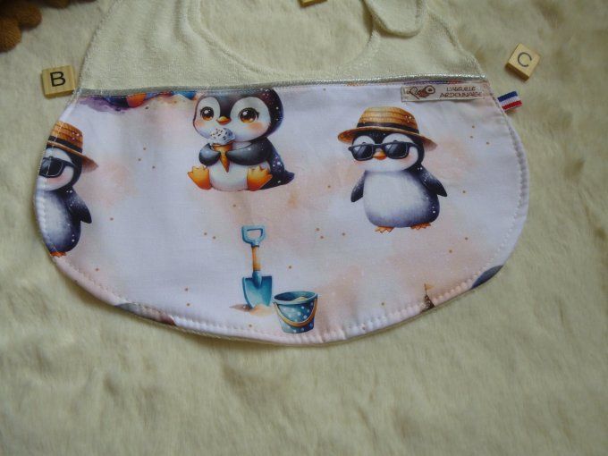   Bavoir pingouin à la plage